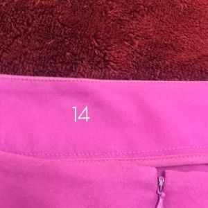 Bright pink Ann Taylor skirt size 14 but has been taken in slightly. Short.